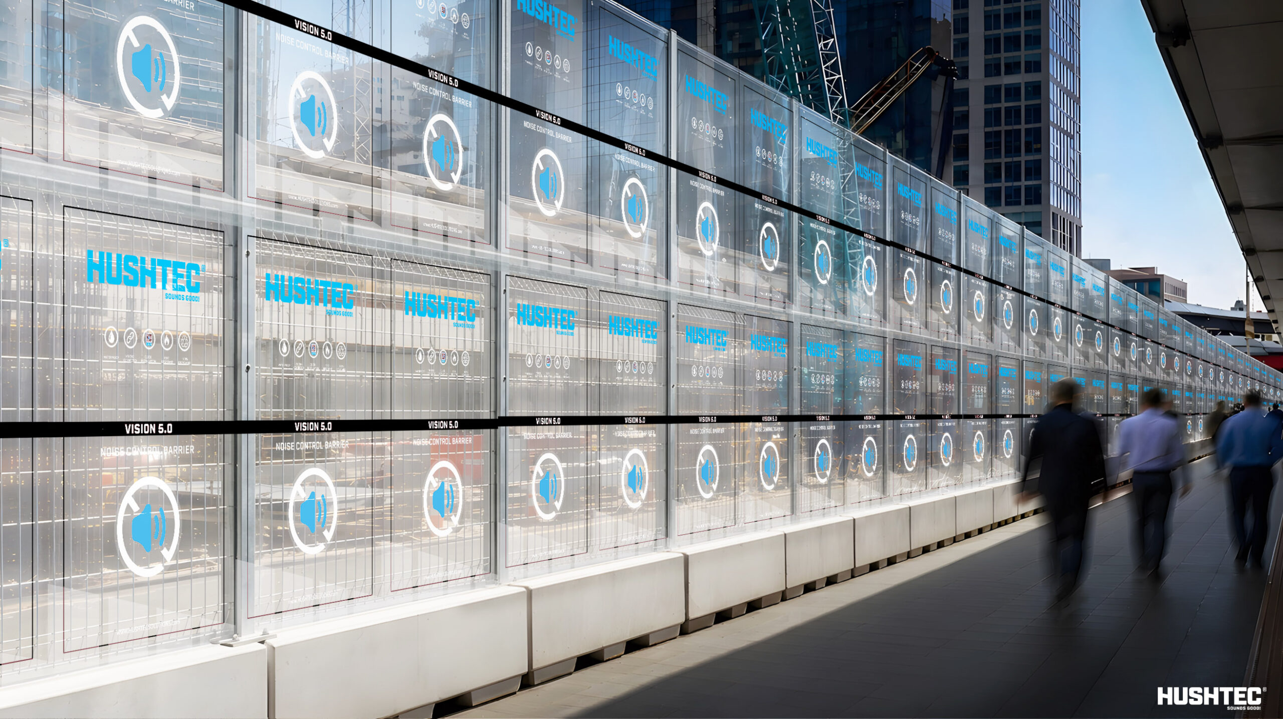 Transparent rail noise barrier along an urban transport corridor.